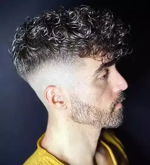 Easily Style Loose Curls With A Mid Bald Fade And Skin Tight Sides Using Pomade For A Touch Of Shine!