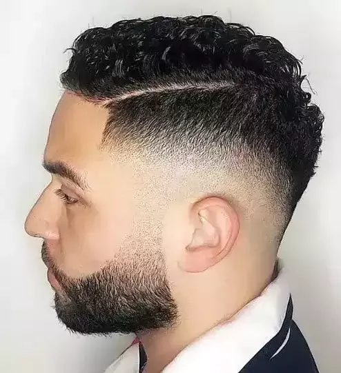 Embrace Your Curls While Staying In Control With A Cool Curly Drop Fade And Side Part