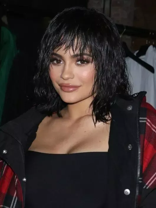 Kylie's Signature, Choppy Long Bob With Tough Chic Layers.