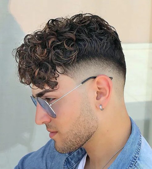 Long Curls, Fringe, Low Skin Fade. Avoid Tight Back And Sides.