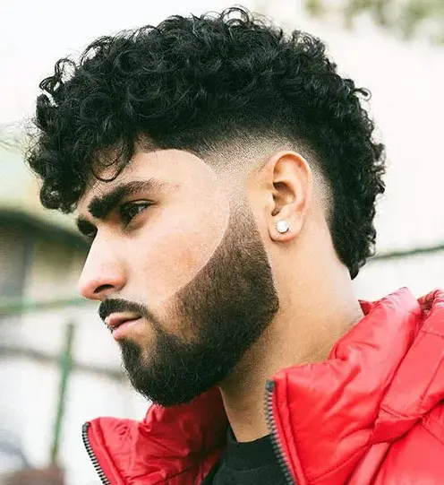 Long Curly Hair, Low Fade Reduces Weight, Long Fringe Adds Interest.