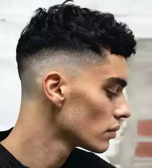 Short Curls With A High Fade Look Clean And Edgy