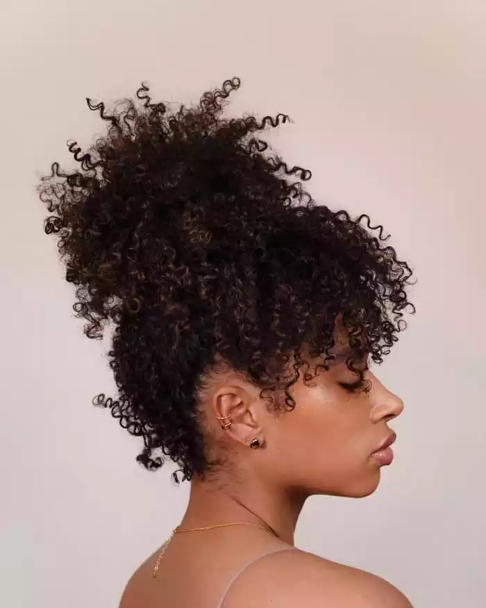 Elevate your look with height! Embrace your curls and keep them moisturized. 💁🏾‍♀️💧 [@freshlengths]