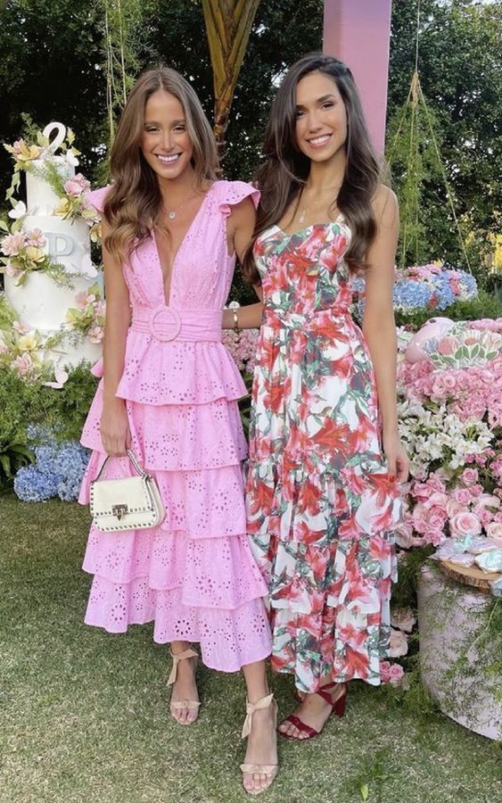 A pink ruffle midi dress a floral midi gown are amazing to attend a summer bridal shower or some other celebration