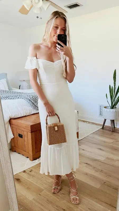 a pretty outfit with an off the shoulder midi dress white lace up shoes and a small woven bag for the party